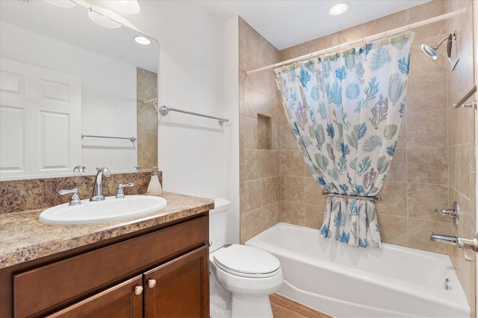 Front bedroom bath with tub/shower combo. - 4348 TUSCALOOSA PATH, THE VILLAGES