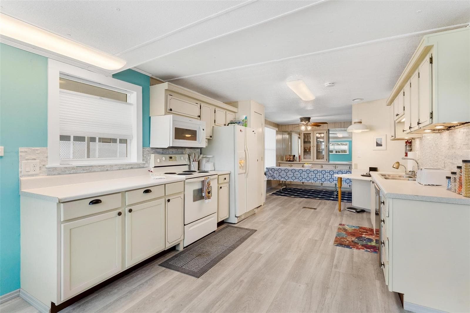 Manufactured Home at 717 W COACH N FOUR DR, LEESBURG, photo 9 of 29