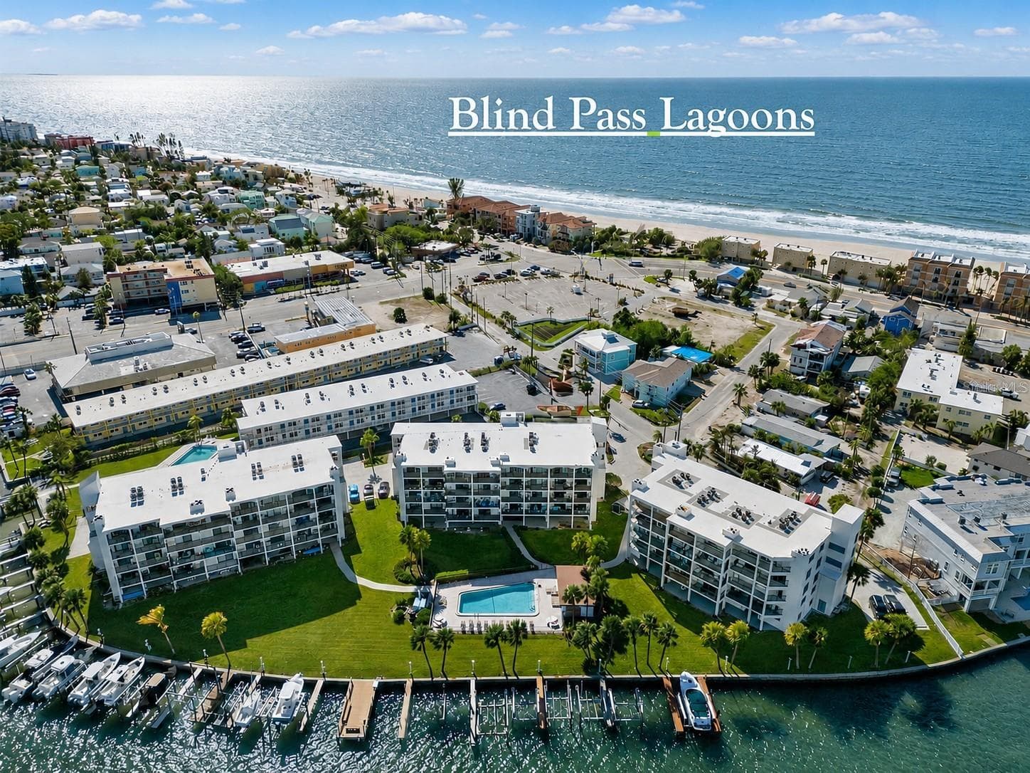 This tastefully designed 2-bedroom, 2-bath corner unit offers 1,250 sq?ft of bright, open living space on the 4th floor, featuring a 28-ft waterfront balcony with panoramic views. - 9825 HARRELL AVE #404, TREASURE ISLAND