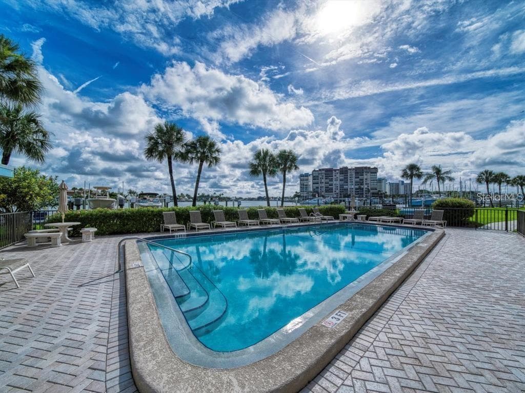 Heated water-front pool - 9825 HARRELL AVE #404, TREASURE ISLAND