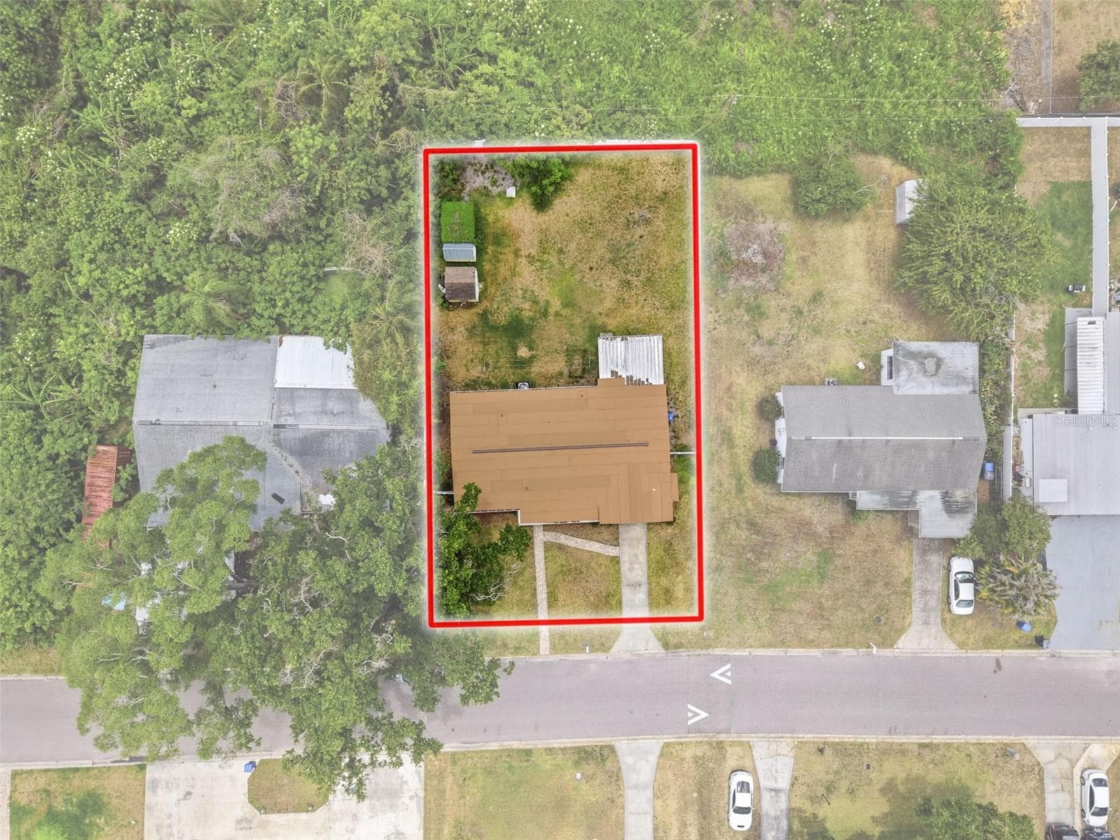 Aerial view of the property that extends 40 ft beyond the backyard fence - 2518 W NORTH ST, TAMPA