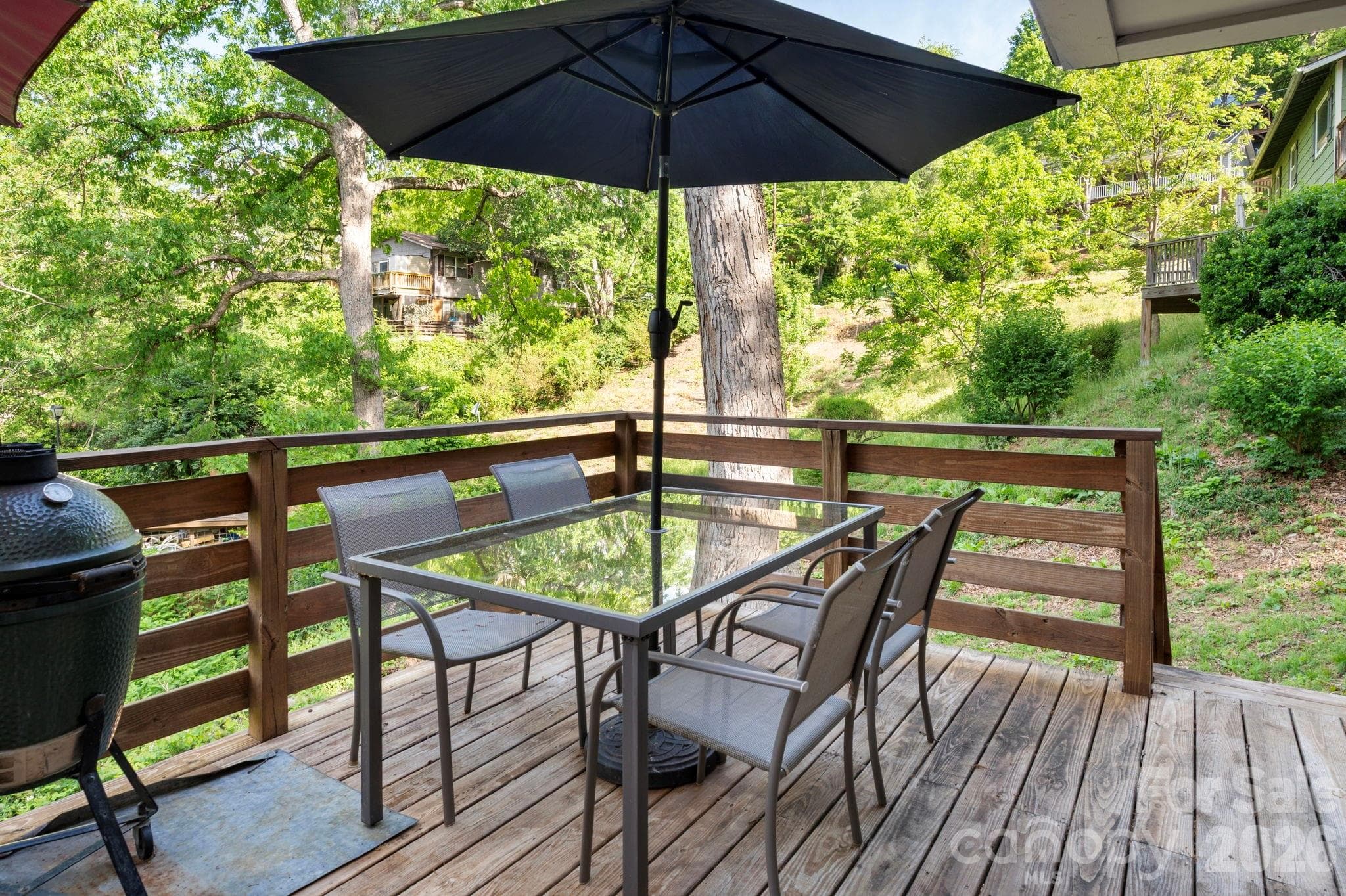 Rear deck with steps leading to backyard - 126 Maney Avenue, Asheville