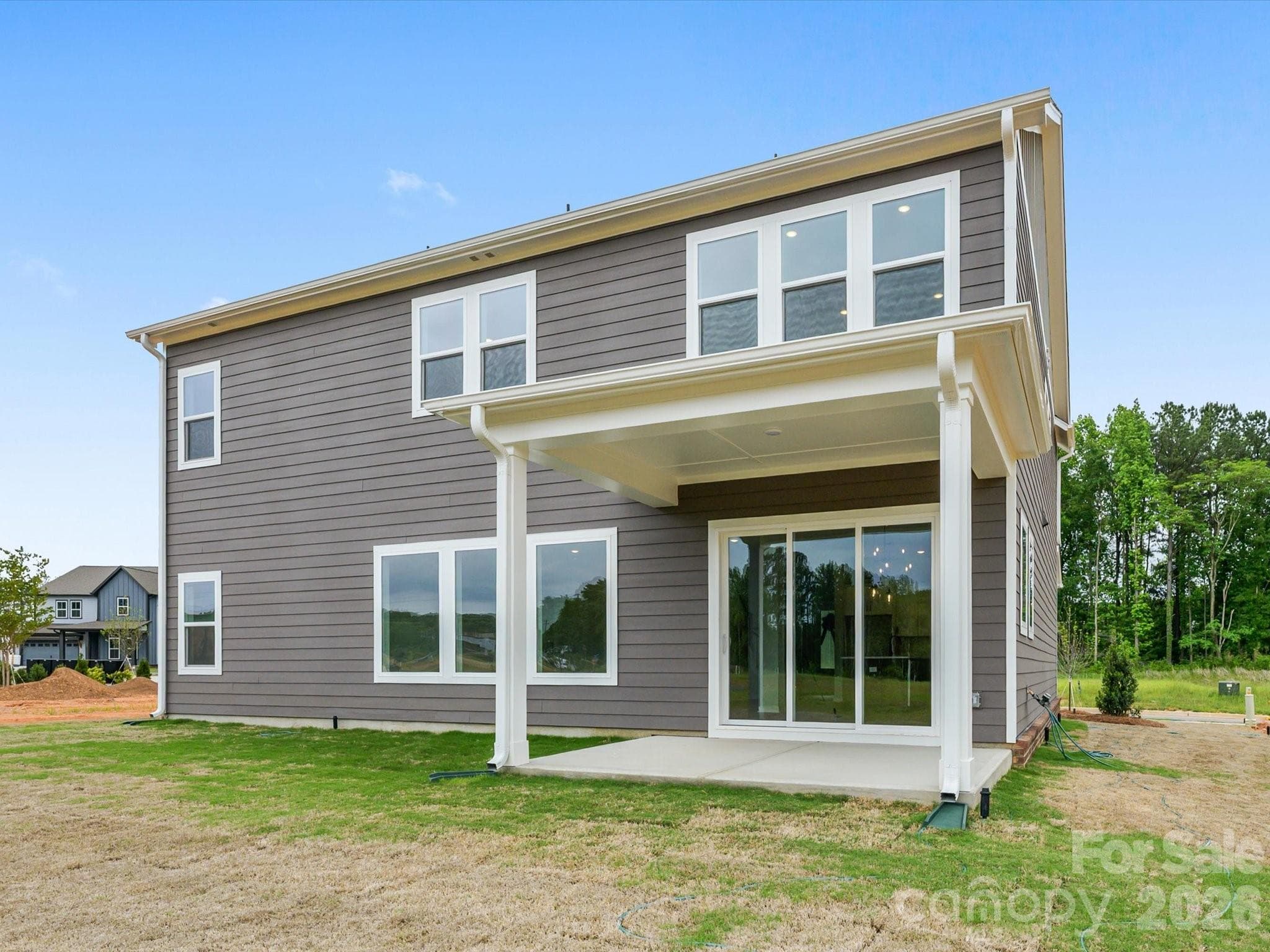 Covered rear porch with telescoping doors. - 333 Portree Street, Rock Hill