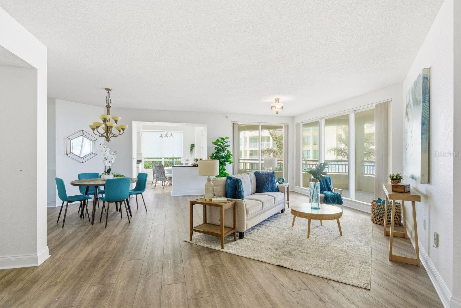 Open living area and dining area - 1170 SE GULF BLVD #305, CLEARWATER BEACH