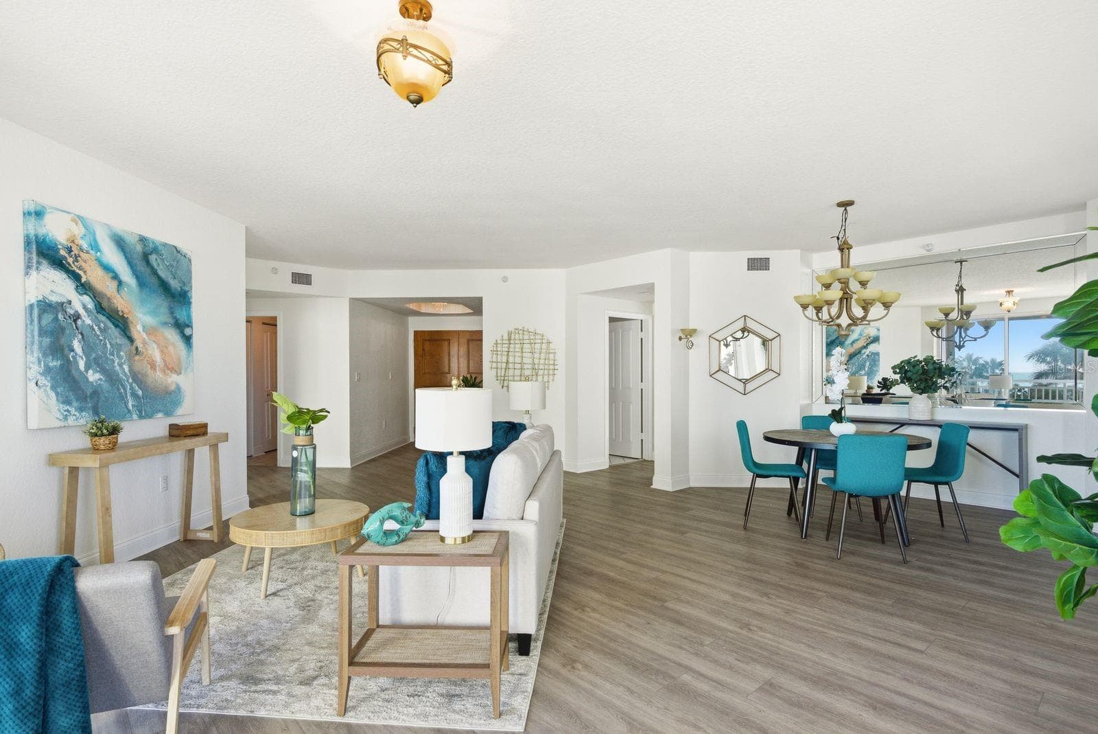 Open living area and dining area - 1170 SE GULF BLVD #305, CLEARWATER BEACH