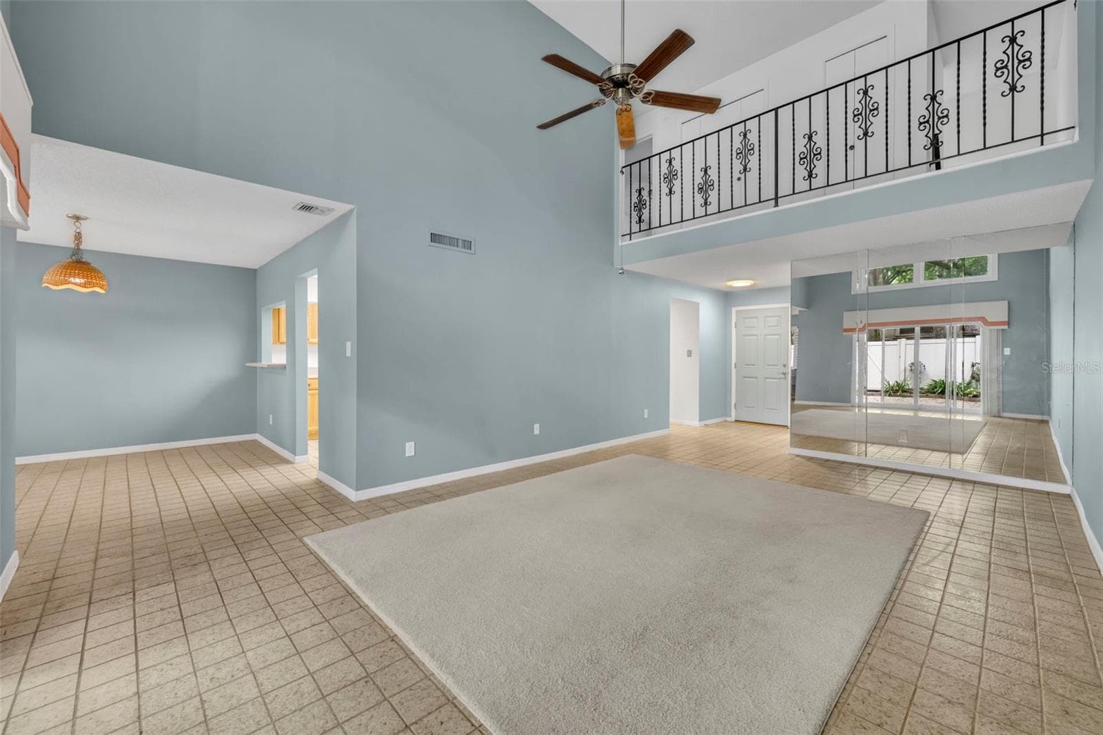 View of dining and upstairs balcony - 497 OAK HAVEN DR #497, ALTAMONTE SPRINGS