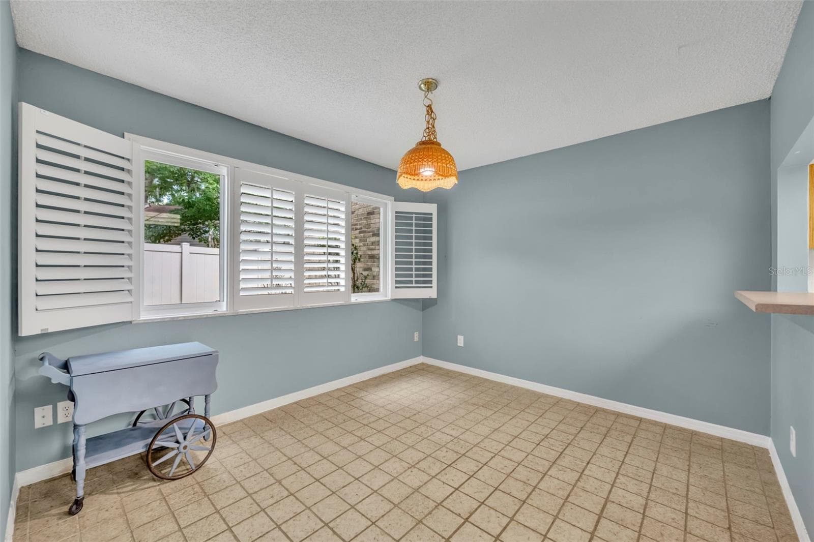 Dining room with plantation shutters - 497 OAK HAVEN DR #497, ALTAMONTE SPRINGS