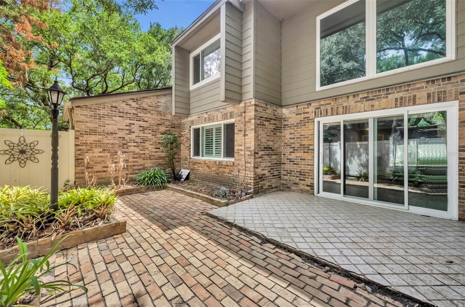 Sliders open to patio - 497 OAK HAVEN DR #497, ALTAMONTE SPRINGS