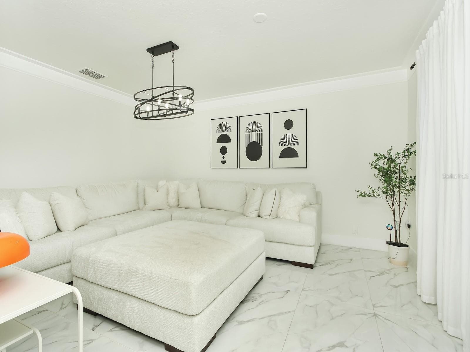 Formal Living room is tuck away for a private setting for late night cap and great conversation - 7561 LAKE ANDREA CIR, MOUNT DORA
