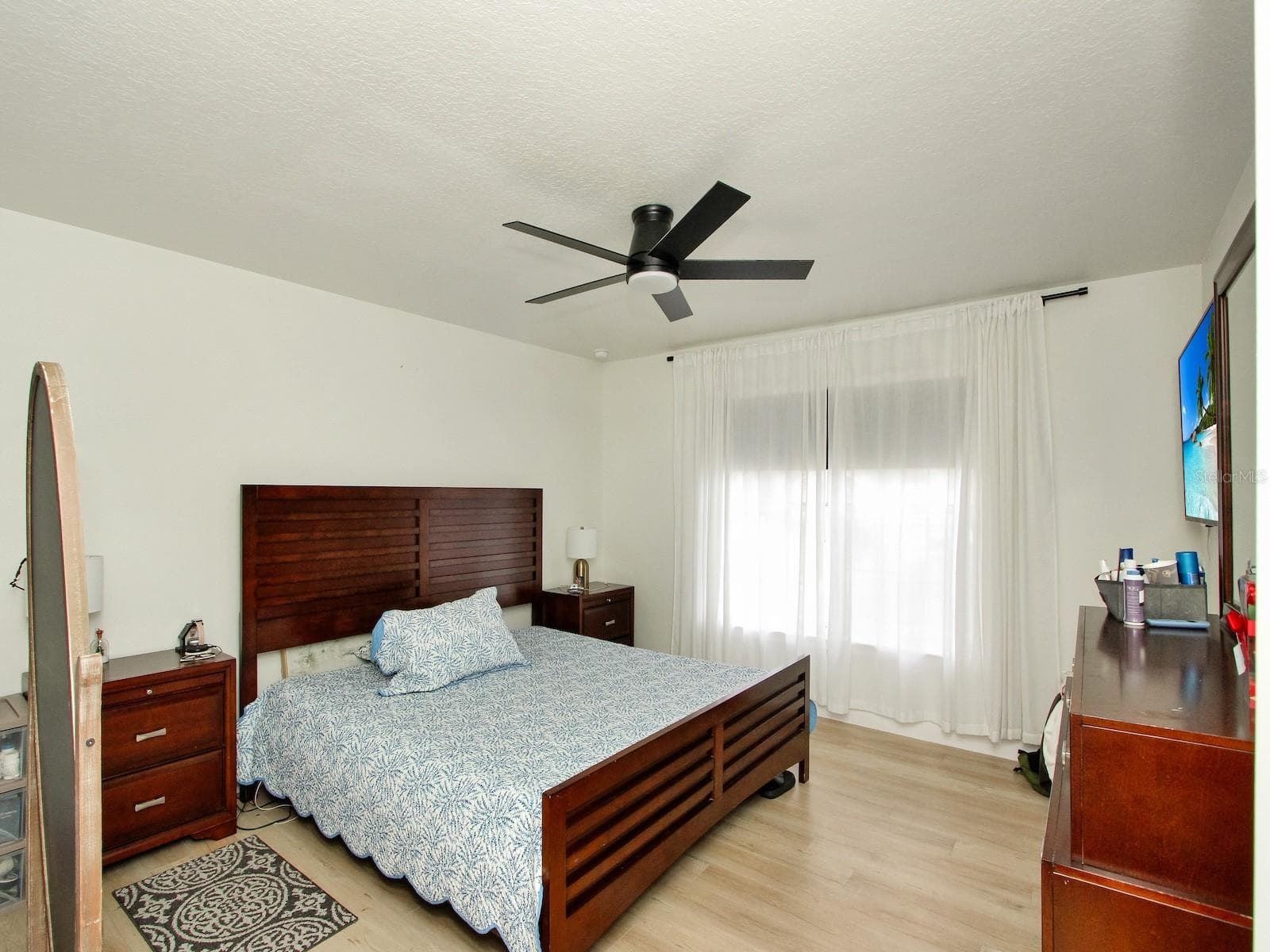 bedroom 4 of five is the biggest of the bedroom in the right side of the home - 7561 LAKE ANDREA CIR, MOUNT DORA