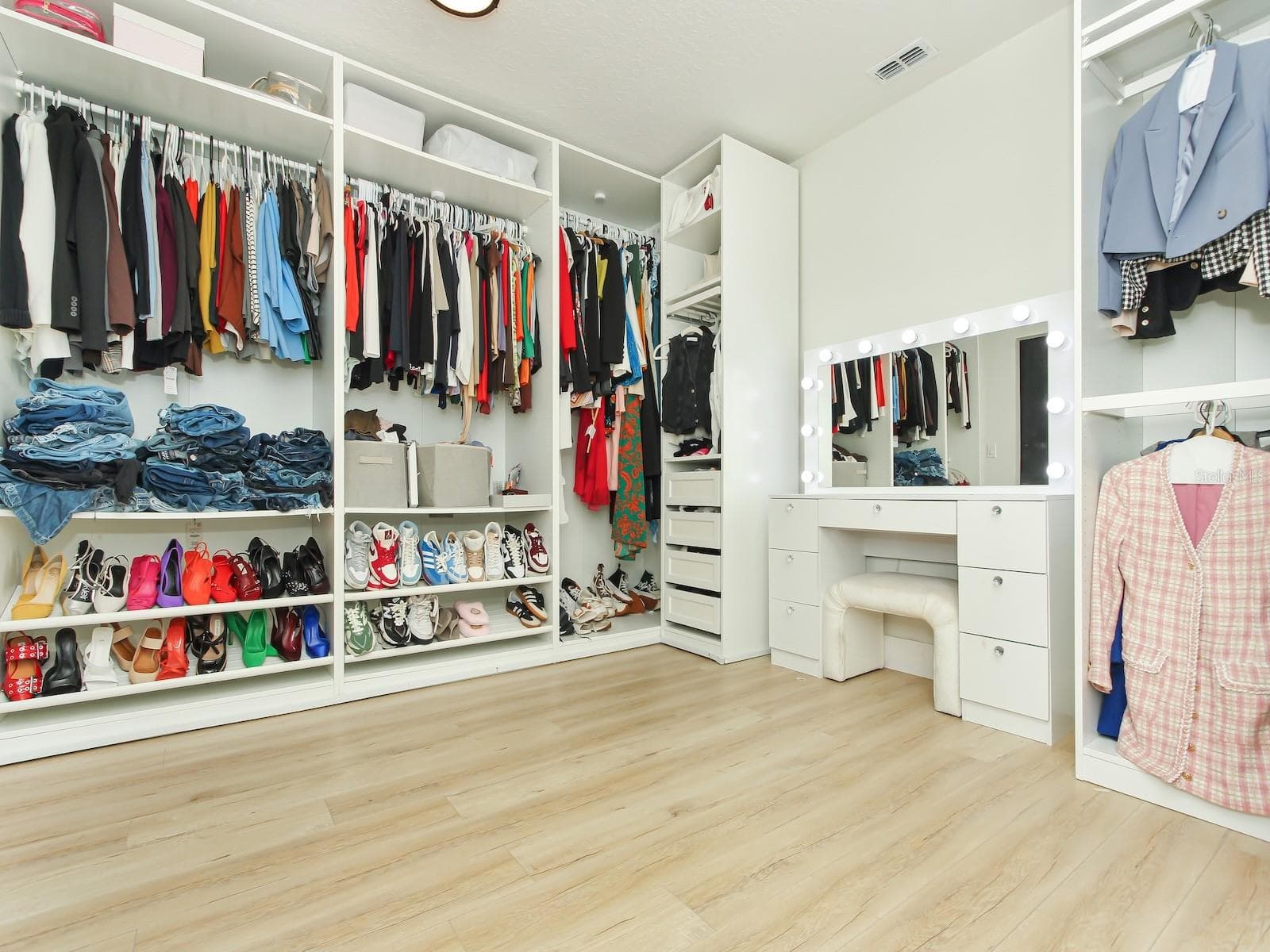 Master closet 1 of 3 is the sive of a bedroom as it sit 11x13 and is decorated and readt for your clothes - 7561 LAKE ANDREA CIR, MOUNT DORA