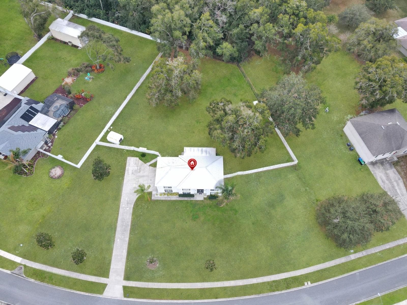 aerial view 8-Showcases the land - 7561 LAKE ANDREA CIR, MOUNT DORA