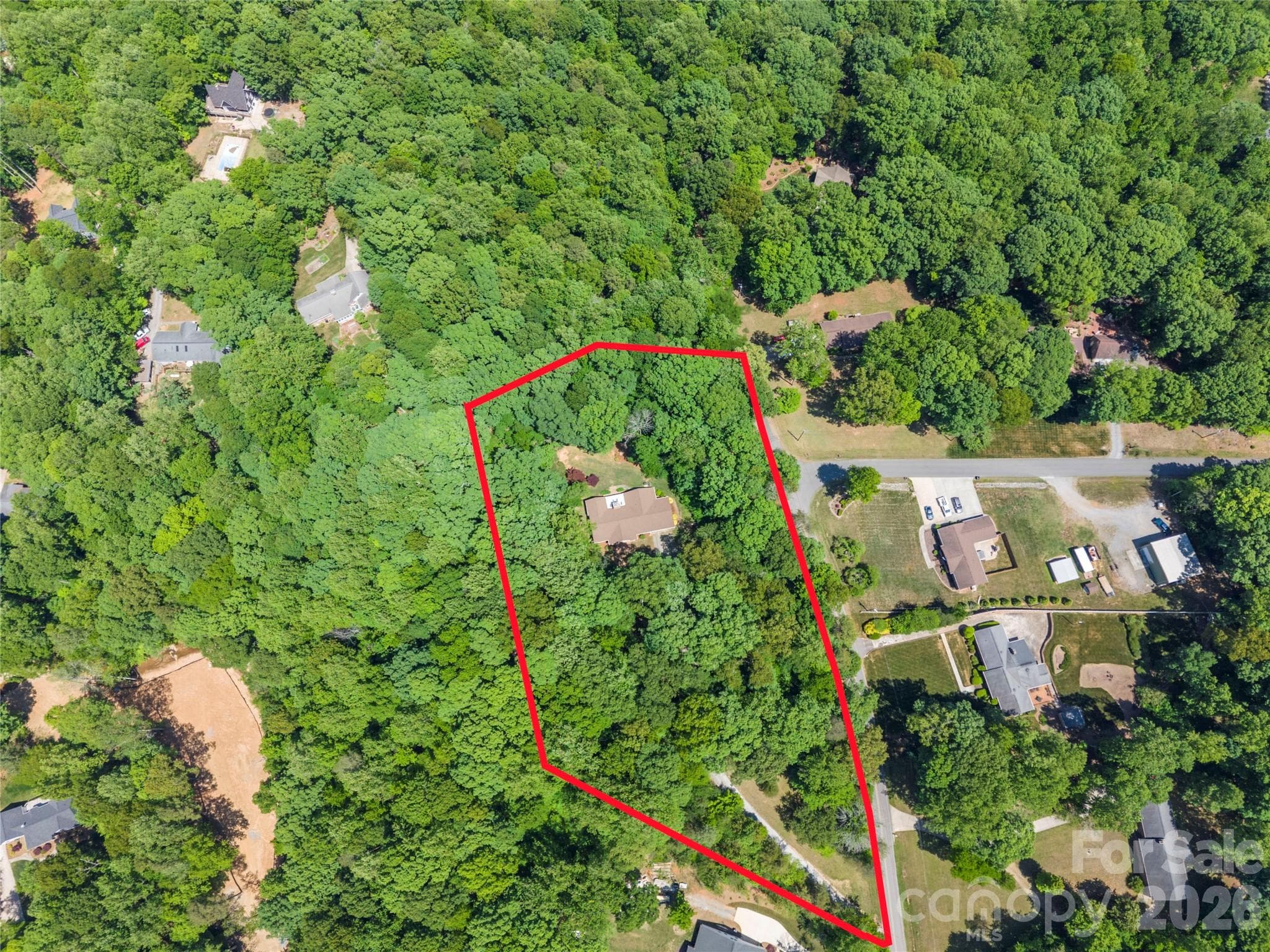 Approximate property line - 3.5 acre lot / fully fenced yard and recently scraped gravel drive - Gastonia