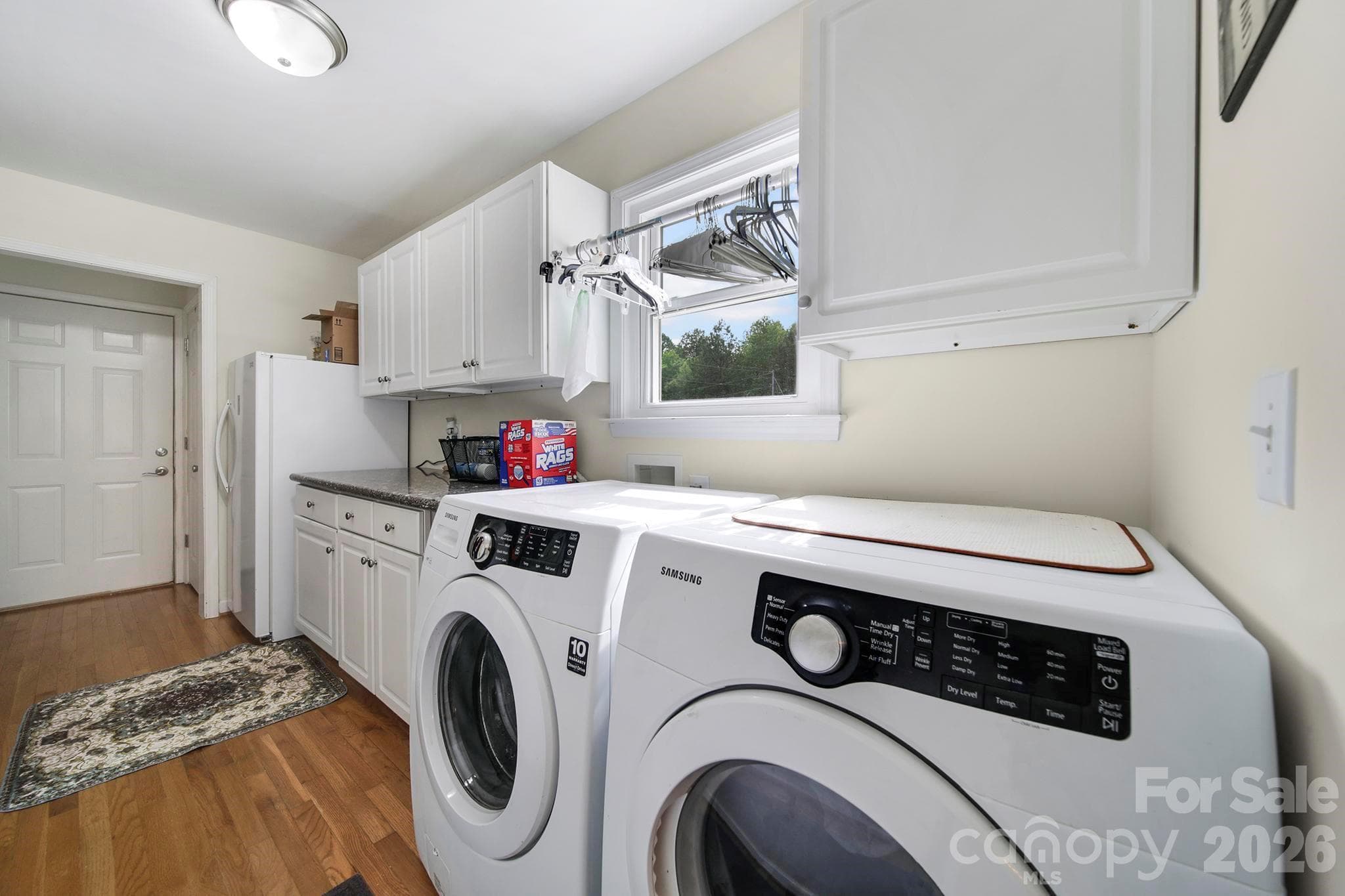 Laundry off kitchen leading to garage - Clover