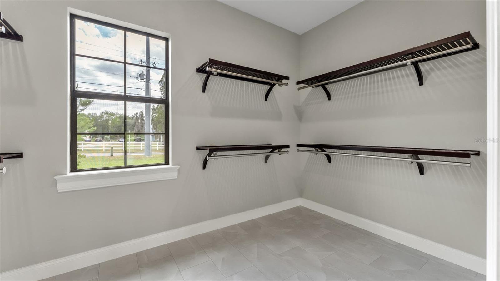 primary bedroom walk-in closet - 6827 LAKELAND HIGHLANDS RD, LAKELAND