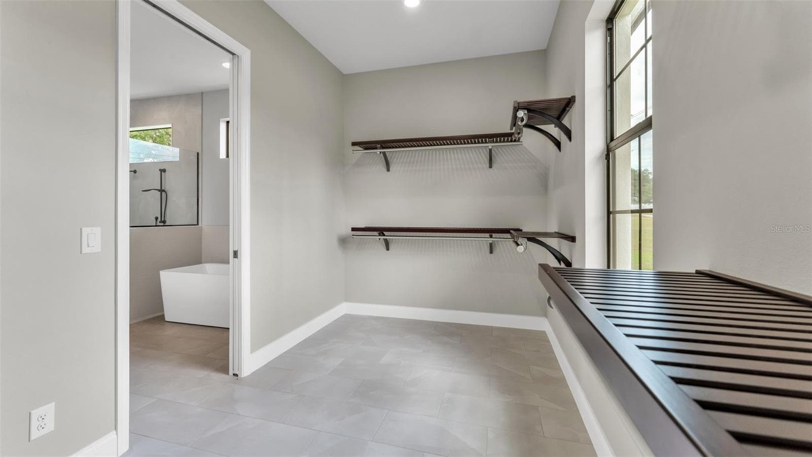 primary bedroom walk-in closet - 6827 LAKELAND HIGHLANDS RD, LAKELAND