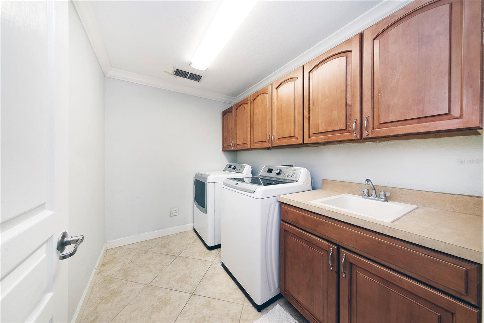 Laundry room - lower level - 1397 LATTIMORE DR, CLERMONT