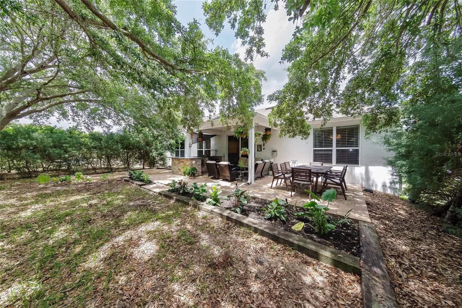 Backyard - view of back patio / landscape - 1397 LATTIMORE DR, CLERMONT