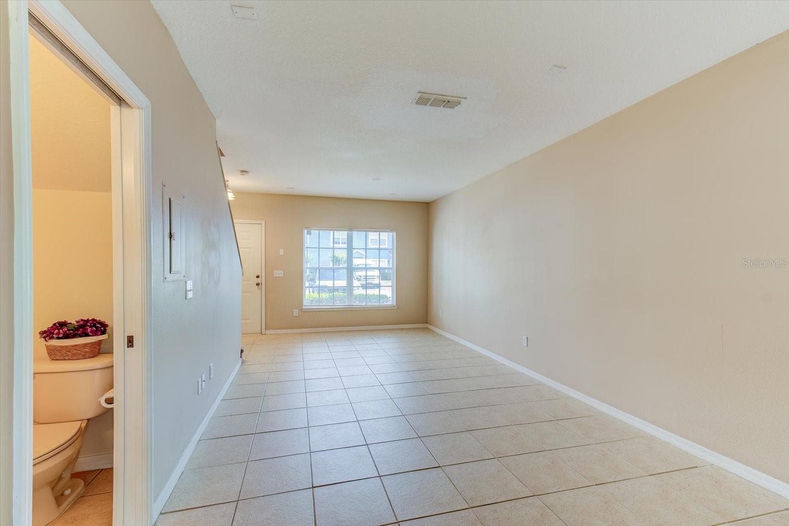 Half Bath & Living/Dining Area - 509 WILTON CIR, SANFORD
