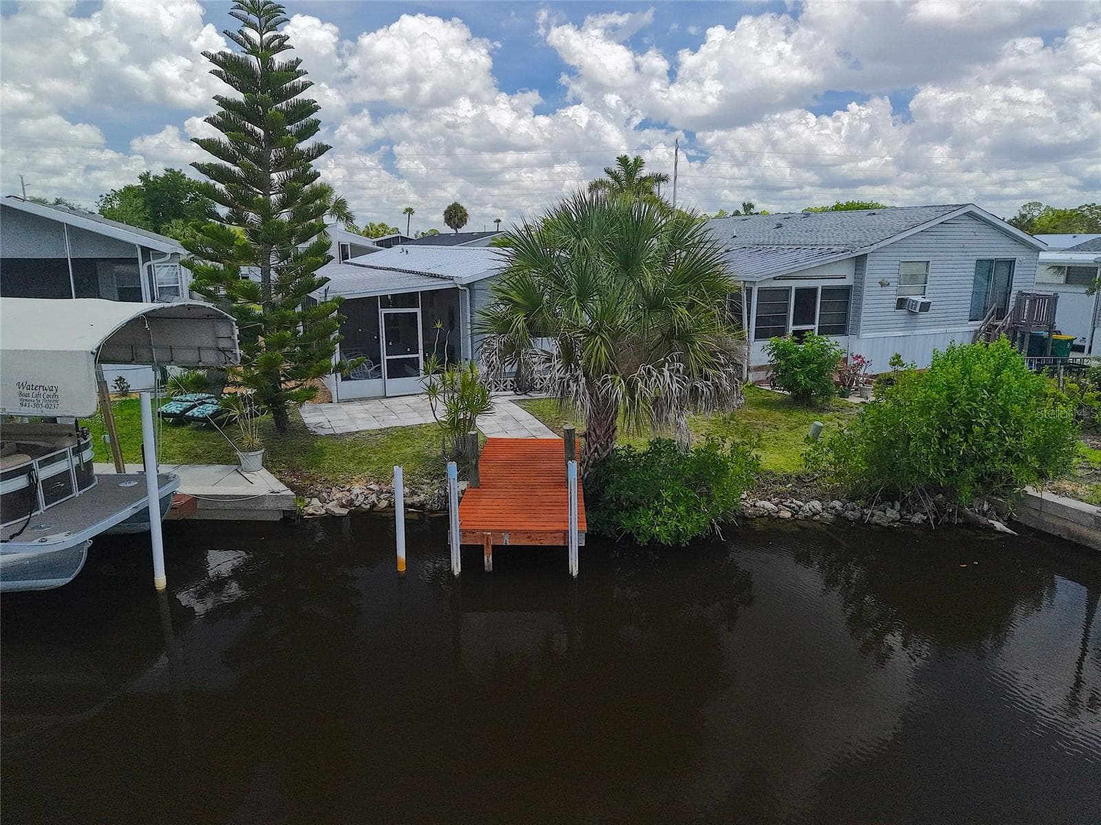 Manufactured Home at 3119 SUNNY HARBOR DR, PUNTA GORDA, photo 2 of 33