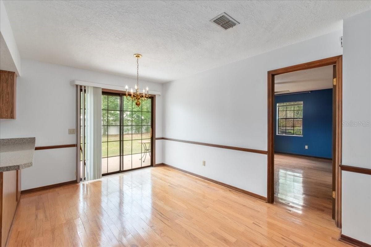 Dining Room with Sliding Door to Backyard - 4515 SE 59TH ST, OCALA