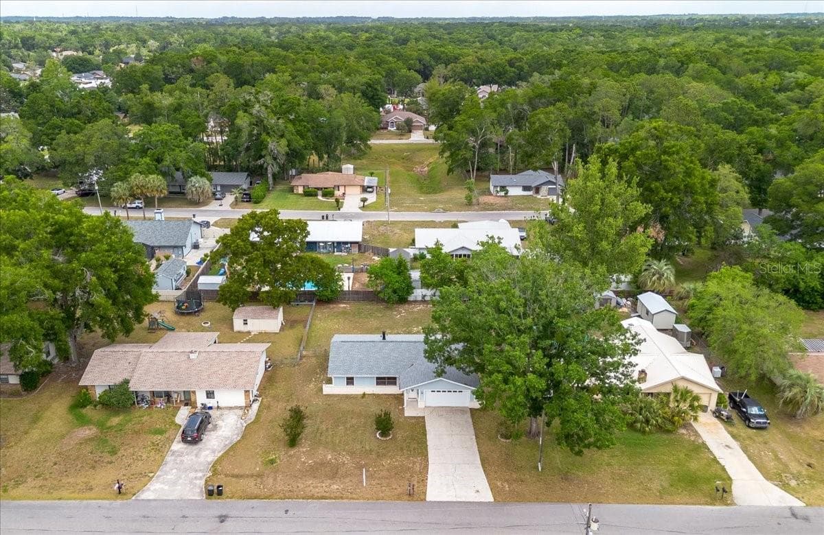 Front of House and Surrounding Neighbors by Drone - 4515 SE 59TH ST, OCALA