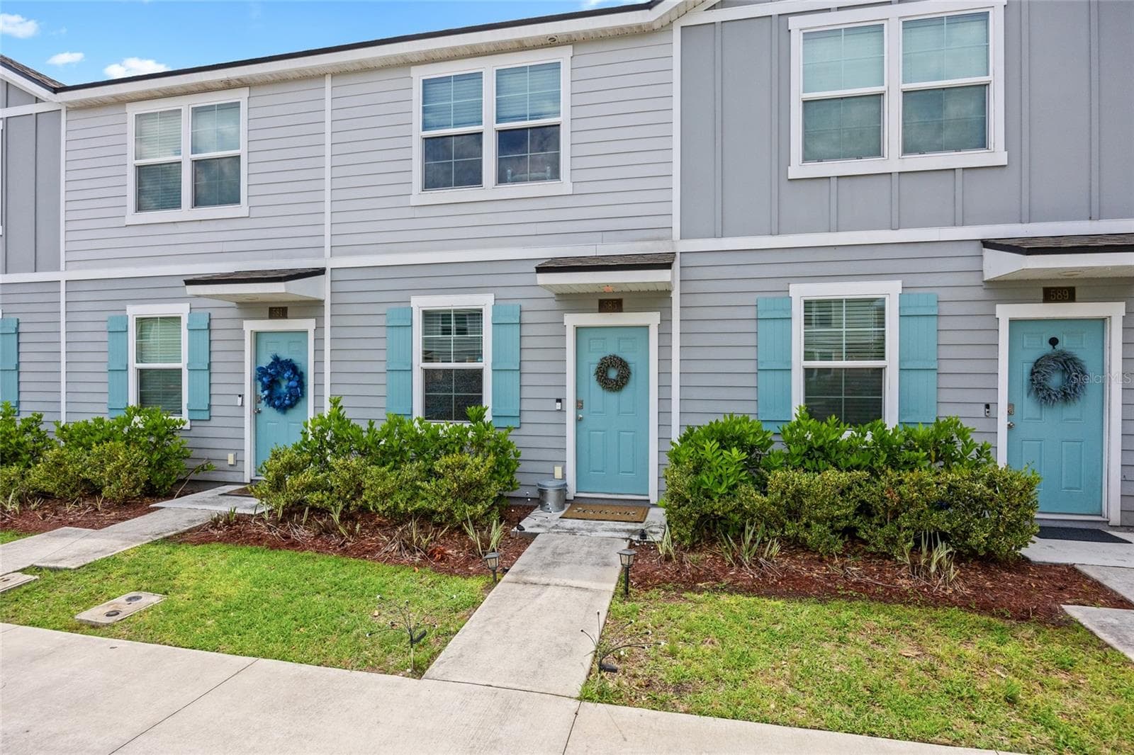townhome entrance - 585 RUNNING WOODS ST, ORANGE PARK