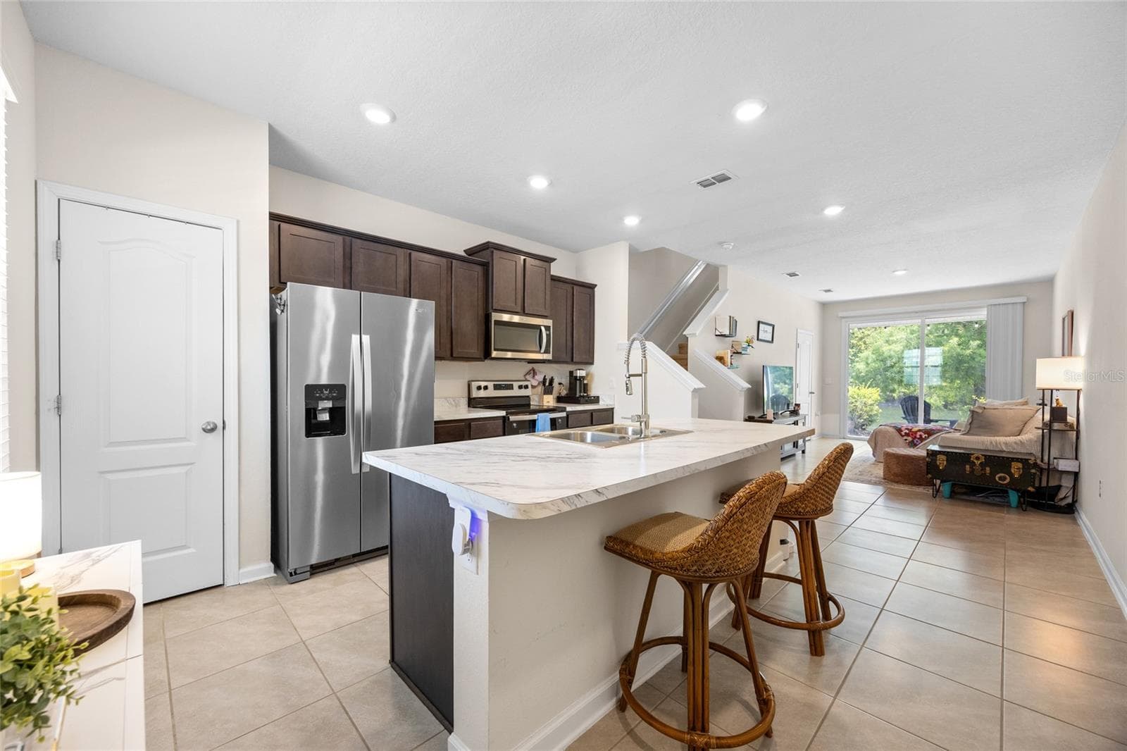 kitchen/island - 585 RUNNING WOODS ST, ORANGE PARK