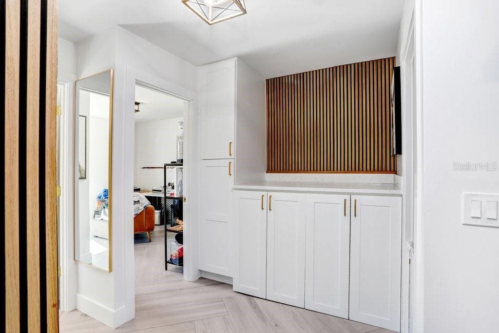 Laundry Cabinet in between 1st and 2nd Guest Rooms - 3926 VENETIAN WAY, TAMPA