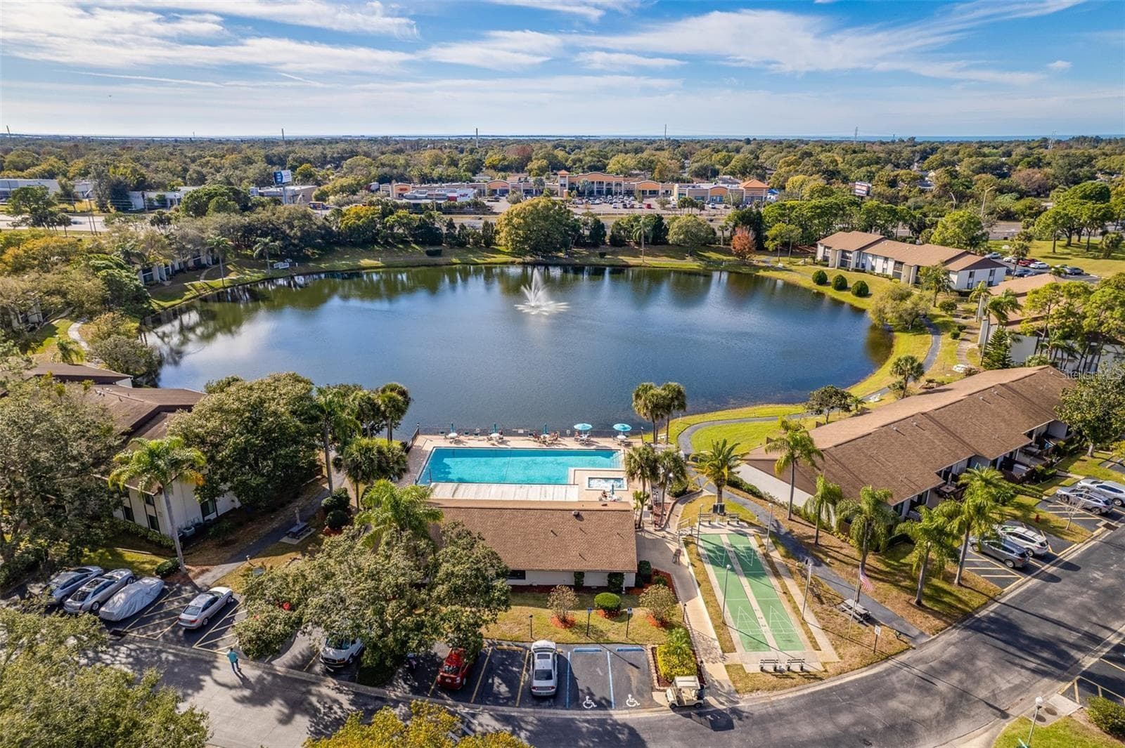 You'll love walking around the pond on peaceful evenings or early mornings~ - 2642 PINE RIDGE WAY S #G2, PALM HARBOR