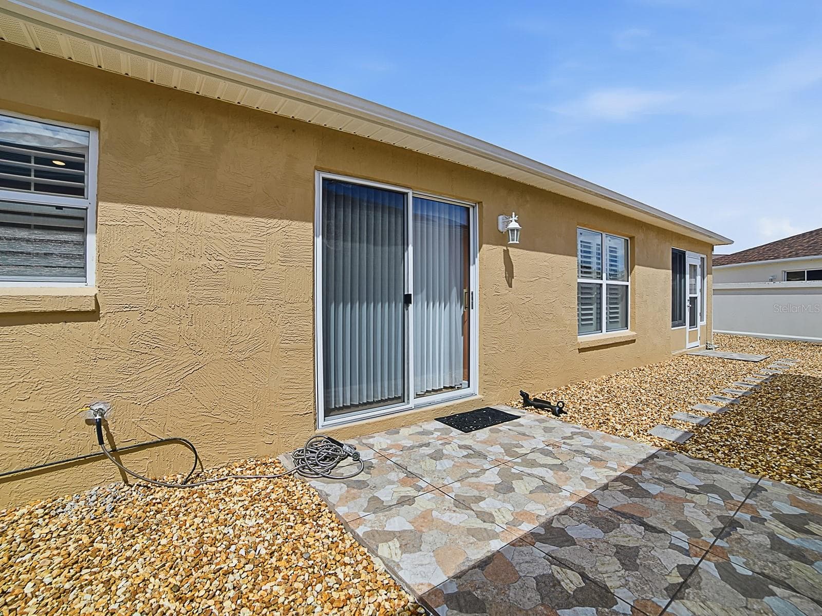 Side Patio - 7631 SE 170TH LONGVIEW LN, THE VILLAGES