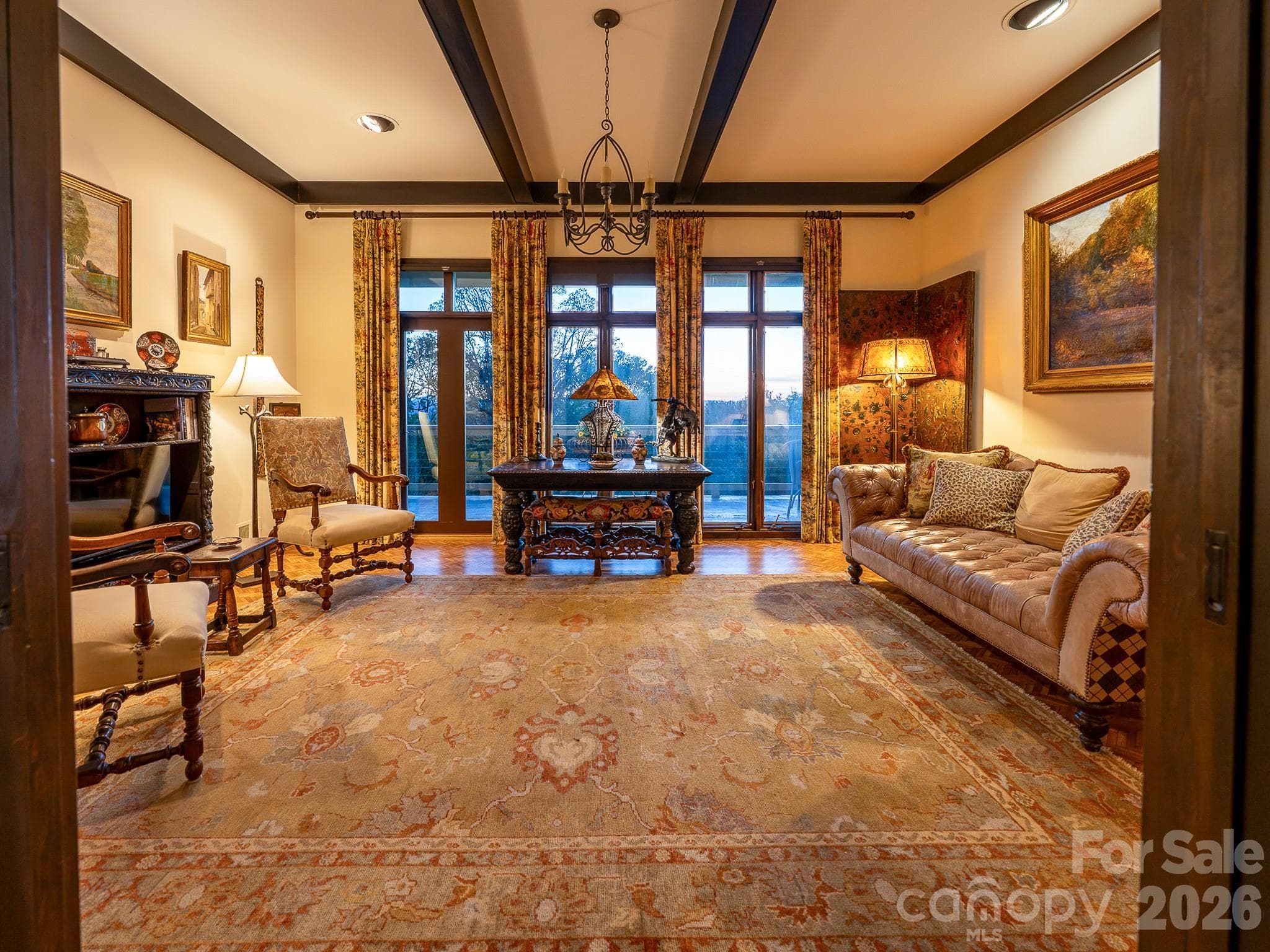 A large den a gathering space designed for conversation, comfort, and endless views - Asheville