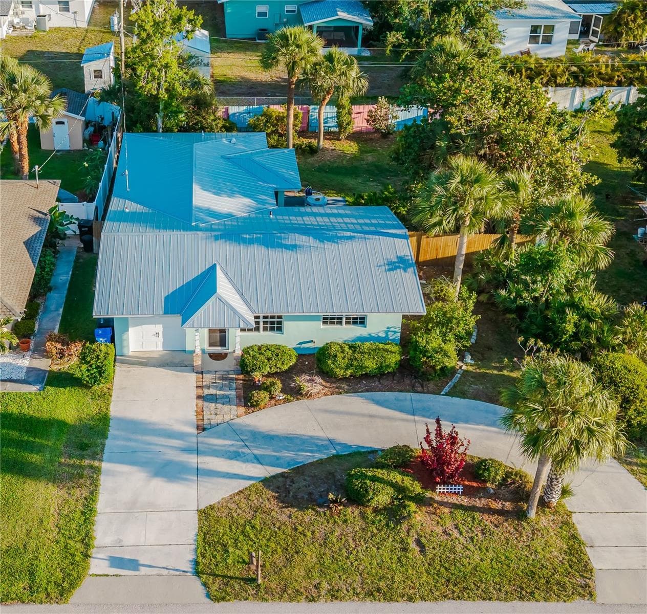 New metal roof.  Circular driveway and garage. - 316 ALBA ST E, VENICE