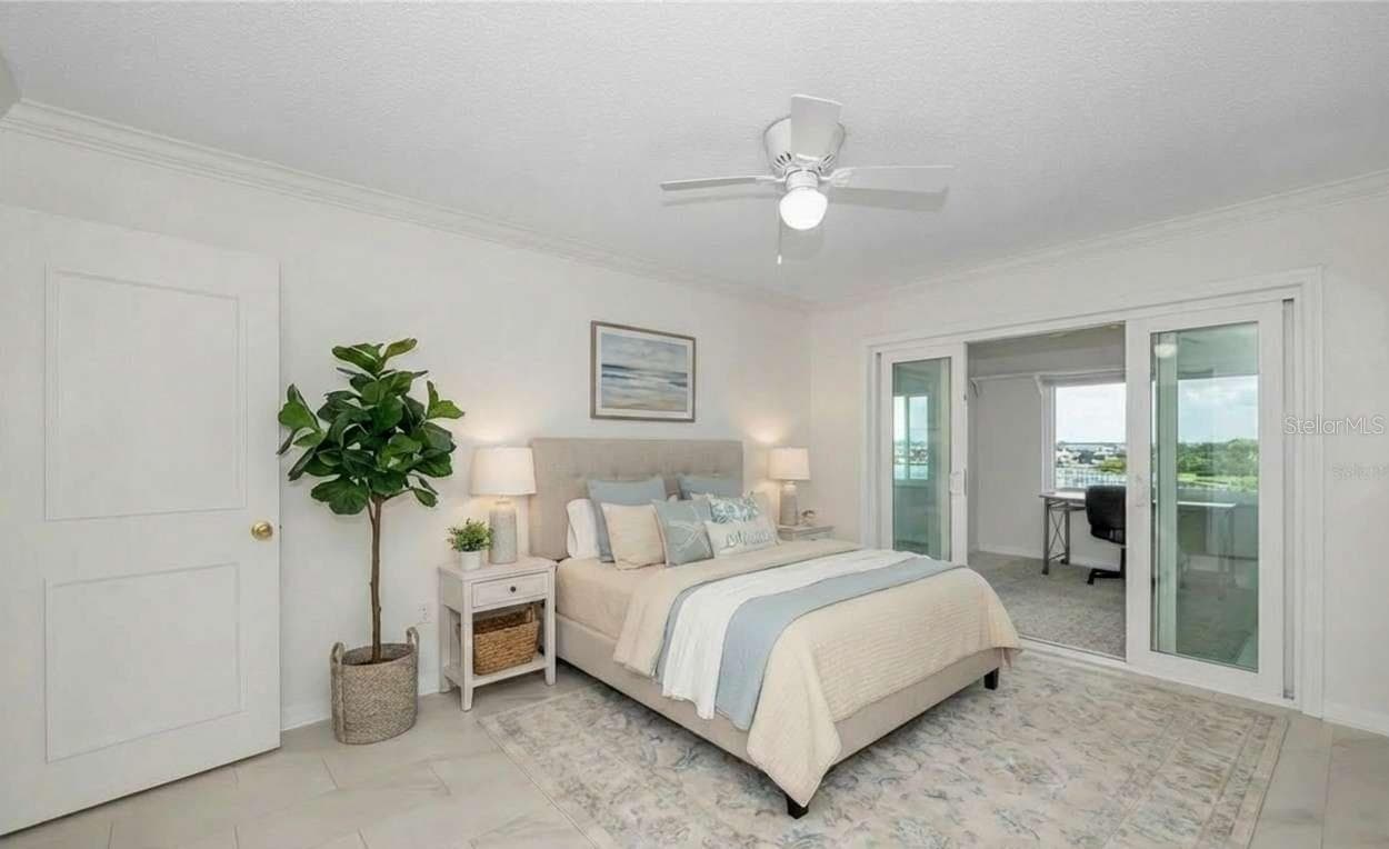 Guest bedroom with view of flex-space - 100 BLUFF VIEW DR #608C, BELLEAIR BLUFFS