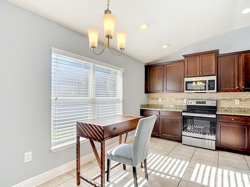 Breakfast nook overlooking kitchen and near pantry - 12244 LOOPBACK DR, SAN ANTONIO