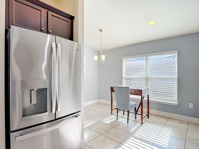 Kitchen looking into breakfast nook - 12244 LOOPBACK DR, SAN ANTONIO