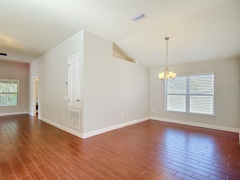 Dining room/living room to the left - 12244 LOOPBACK DR, SAN ANTONIO