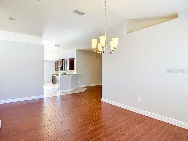 Dining room looking into kitchen - 12244 LOOPBACK DR, SAN ANTONIO