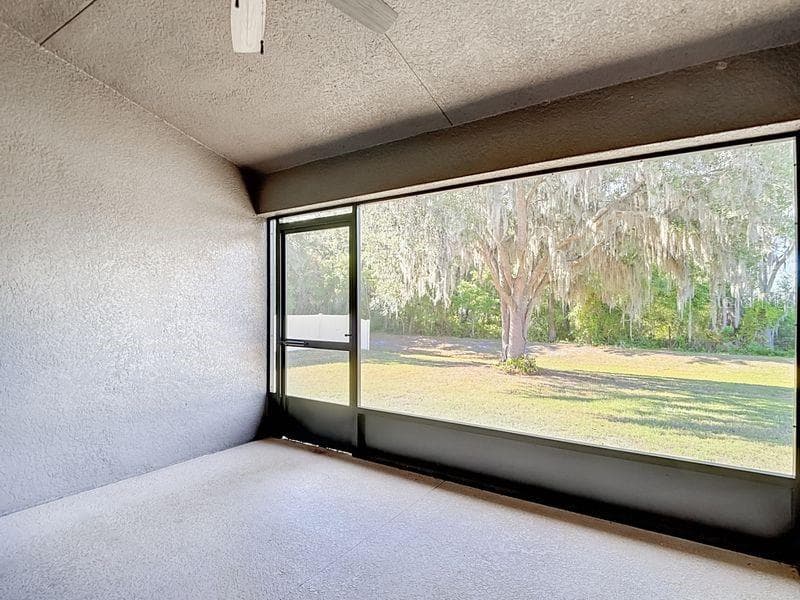 Enjoy tranquil views from the screened in back porch which opens to the spacious backyard. Perfect for relaxing outdoors!!! - 12244 LOOPBACK DR, SAN ANTONIO