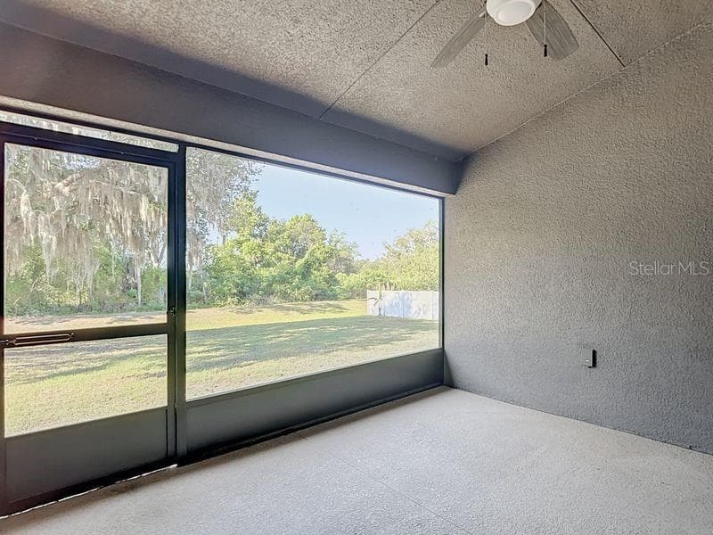 Enjoy tranquil views from the screened in back porch which opens to the spacious backyard. Perfect for relaxing outdoors!!! - 12244 LOOPBACK DR, SAN ANTONIO