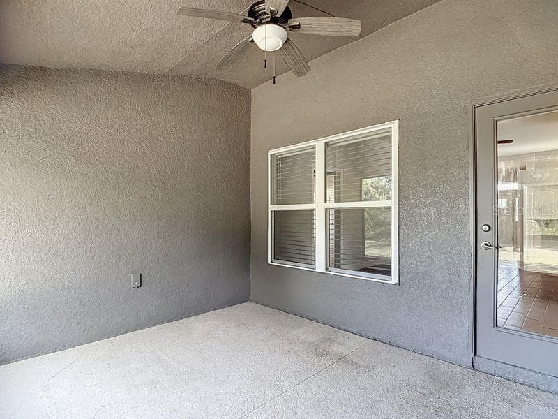 Enjoy tranquil views from the screened in back porch which opens to the spacious backyard. Perfect for relaxing outdoors!!! - 12244 LOOPBACK DR, SAN ANTONIO