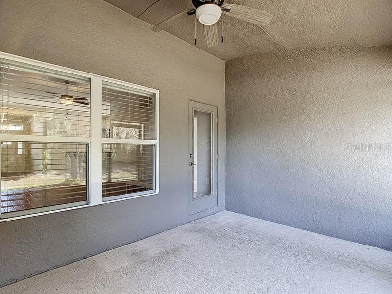 Enjoy tranquil views from the screened in back porch which opens to the spacious backyard. Perfect for relaxing outdoors!!! - 12244 LOOPBACK DR, SAN ANTONIO