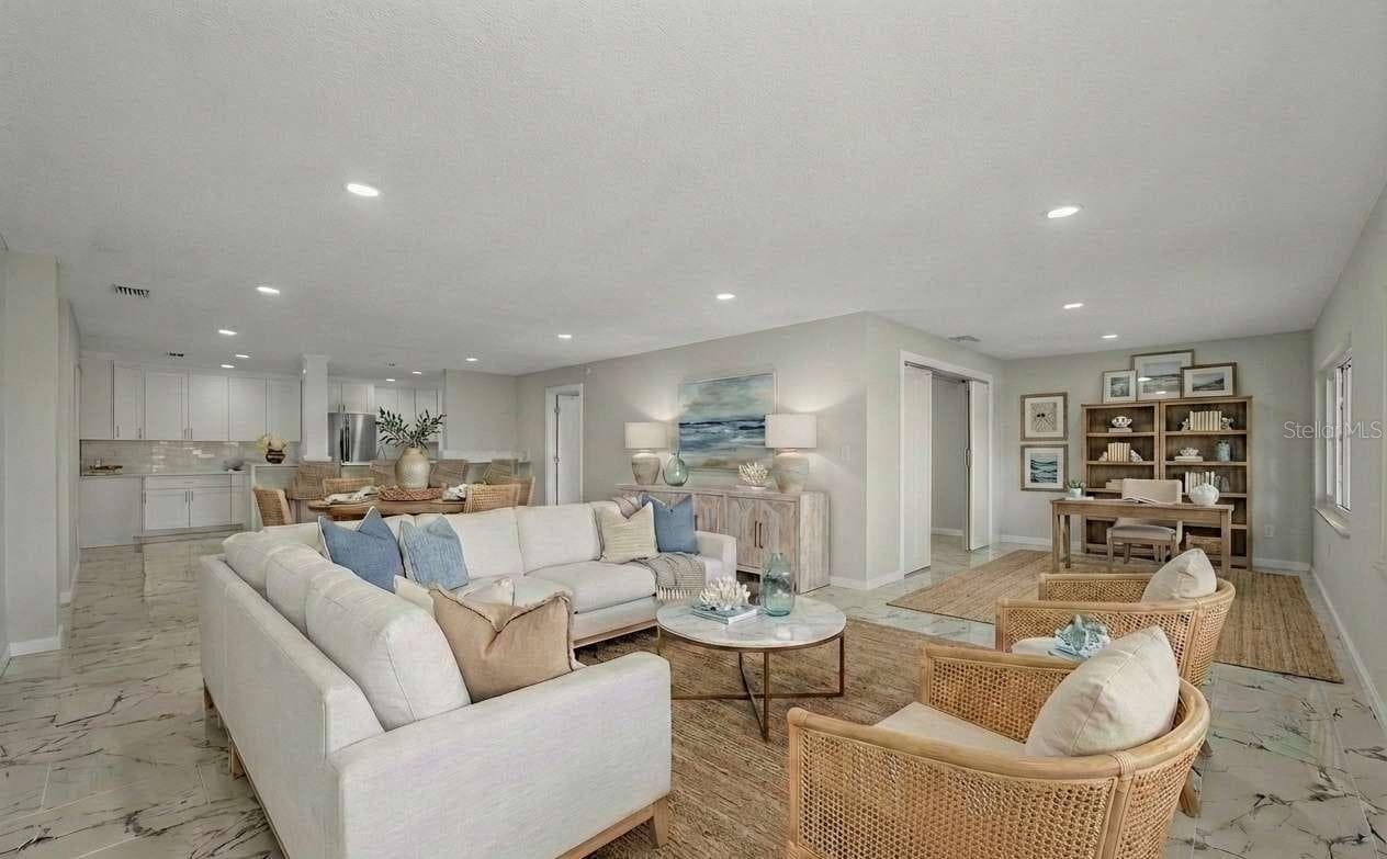 Virtual staged living/dining area with flex space - 100 BLUFF VIEW DR #604C, BELLEAIR BLUFFS