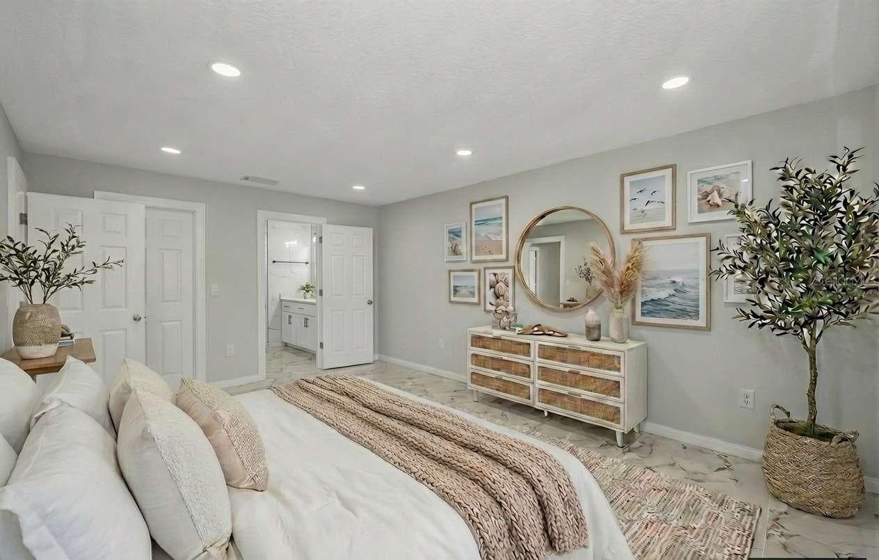 Virtual staged guest bedroom - 100 BLUFF VIEW DR #604C, BELLEAIR BLUFFS