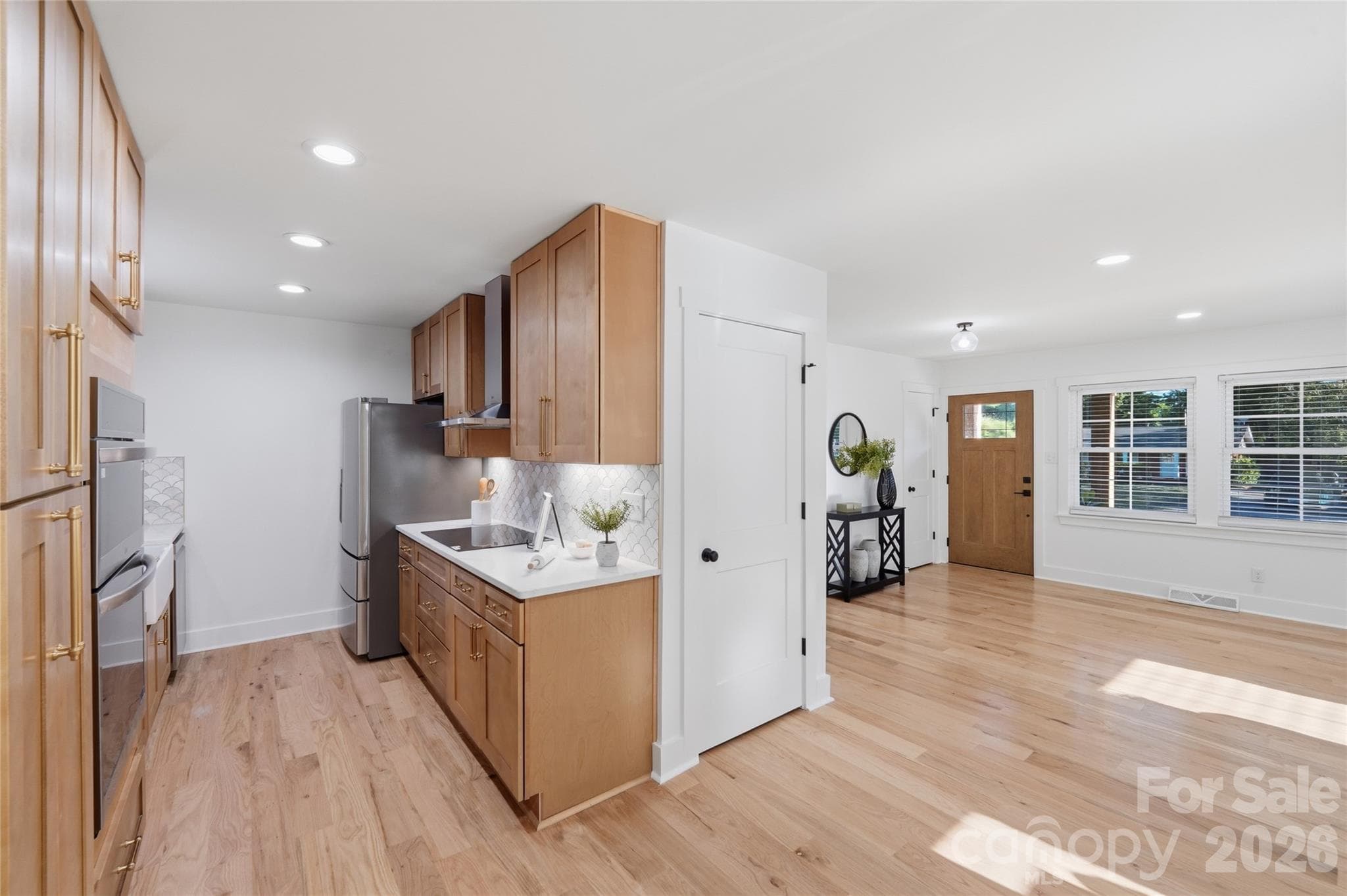 View of laundry closet off kitchen. - 4314 Ivanhoe Place, Charlotte