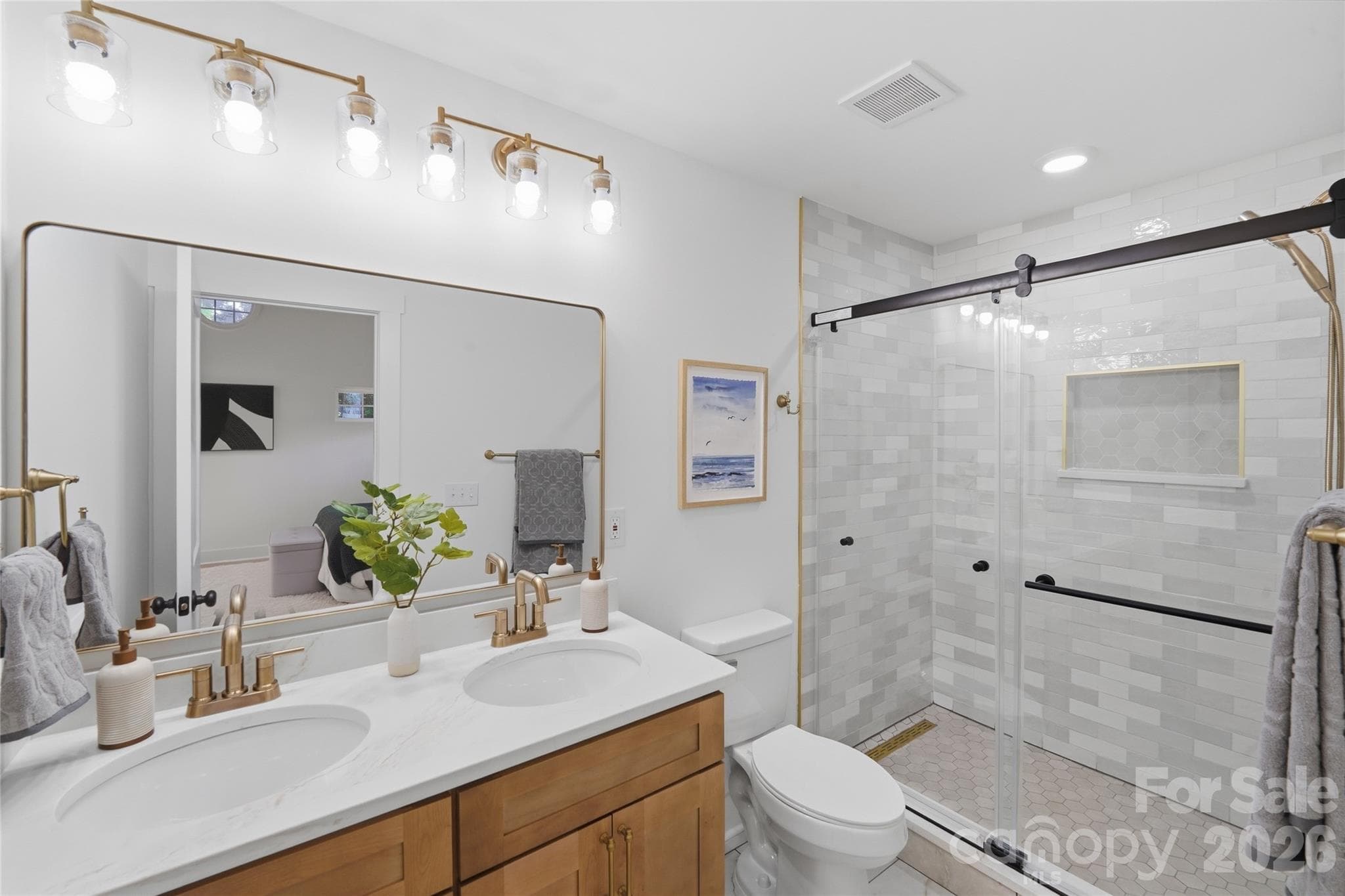 Beautifully coordinated primary en suite continuing the color scheme throughout the house. - 4314 Ivanhoe Place, Charlotte