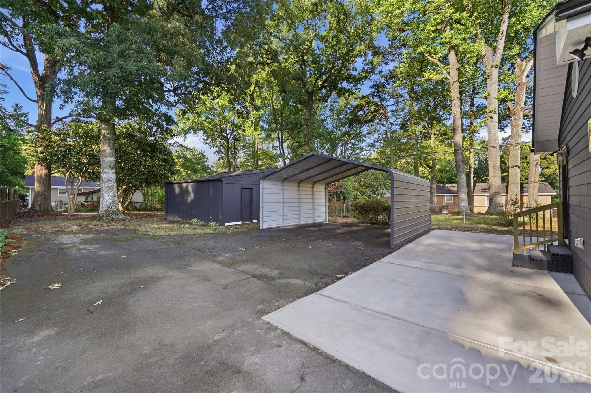 Extended concrete patio great for cookouts and entertaining. - 4314 Ivanhoe Place, Charlotte