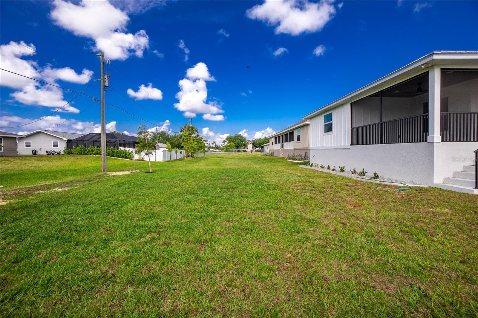 Single Family Residence at 323 BOCA GRANDE BLVD, PUNTA GORDA, photo 45 of 77