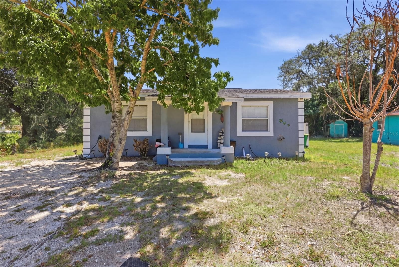 View of mature landscaping. - 2559 HARRY T MOORE AVE, MIMS