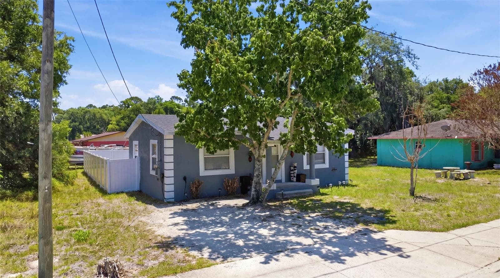 Side view of property. - 2559 HARRY T MOORE AVE, MIMS